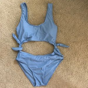 One piece bathing suit with stomach cut out